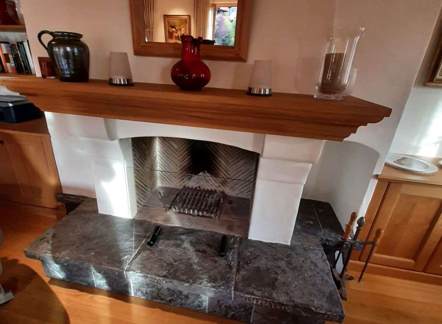 This cozy living space features a charming fireplace, perfect for creating a warm and inviting atmosphere.