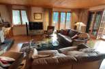 Experience luxury living in this stunning property featuring a warm and inviting wooden ceiling.