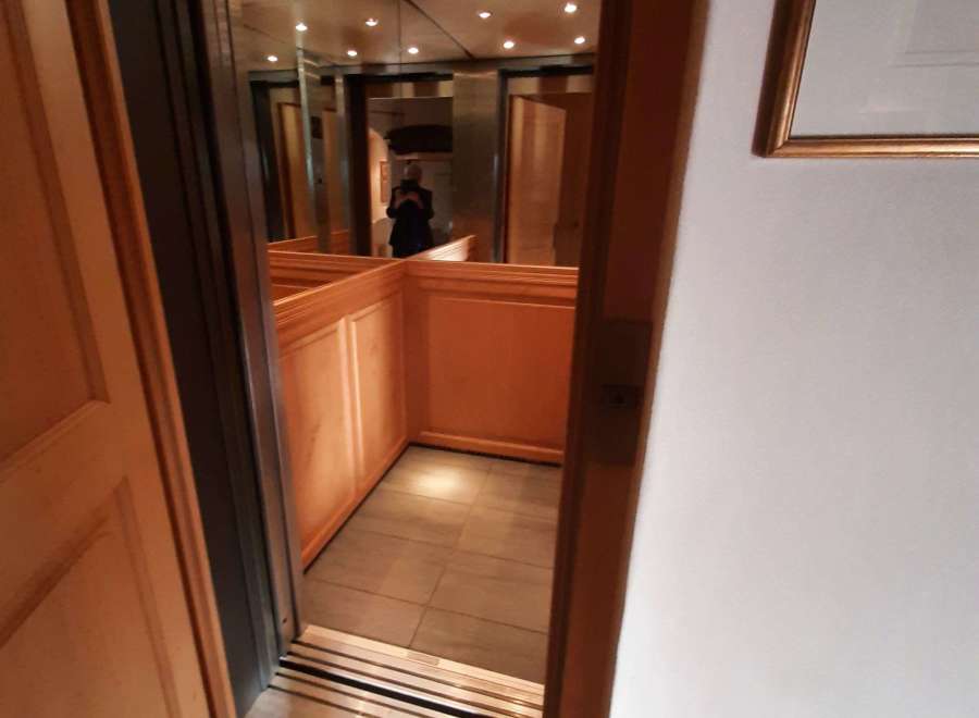 Step into luxury with this stunning property featuring a modern elevator.