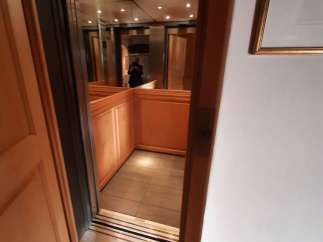 Step into luxury with this stunning property featuring a modern elevator.