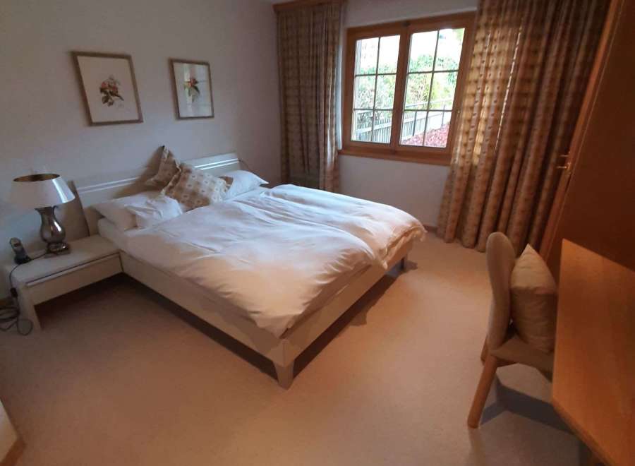 Cozy bedroom with a comfortable double bed, perfect for a relaxing stay.