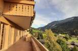 Enjoy breathtaking mountain views from this stunning balcony.