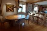 This charming property boasts a warm and inviting interior with a beautiful wooden ceiling and flooring.