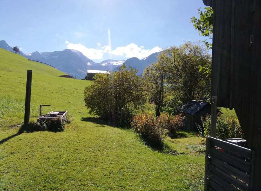 Nestled in a picturesque landscape, this property offers stunning views of rolling green hills and majestic mountains.