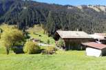 Nestled in a picturesque landscape, this property boasts charming wooden structures.