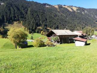 Nestled in a picturesque mountain setting, this charming property offers a tranquil escape.