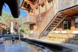 Experience the charm of this stunning wooden chalet, showcasing intricate architectural details.