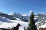 Enjoy breathtaking mountain views from this cozy chalet.