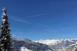 Experience the breathtaking beauty of a snow-covered mountain landscape.