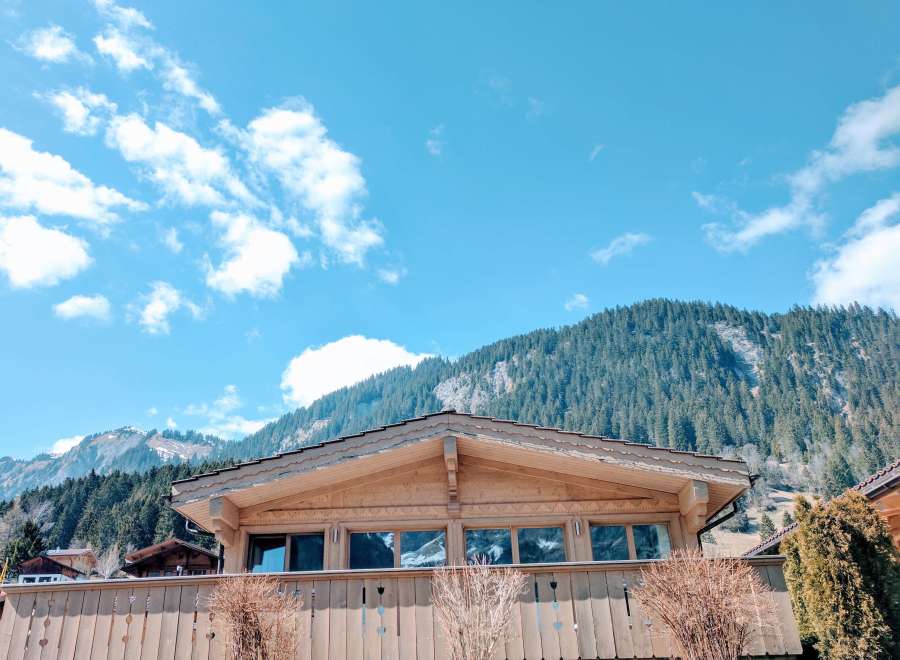 Escape to the mountains in this charming wooden chalet, offering stunning views of the surrounding peaks.