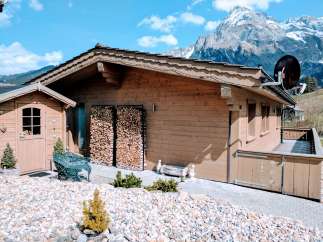 Escape to the mountains in this charming wooden chalet.