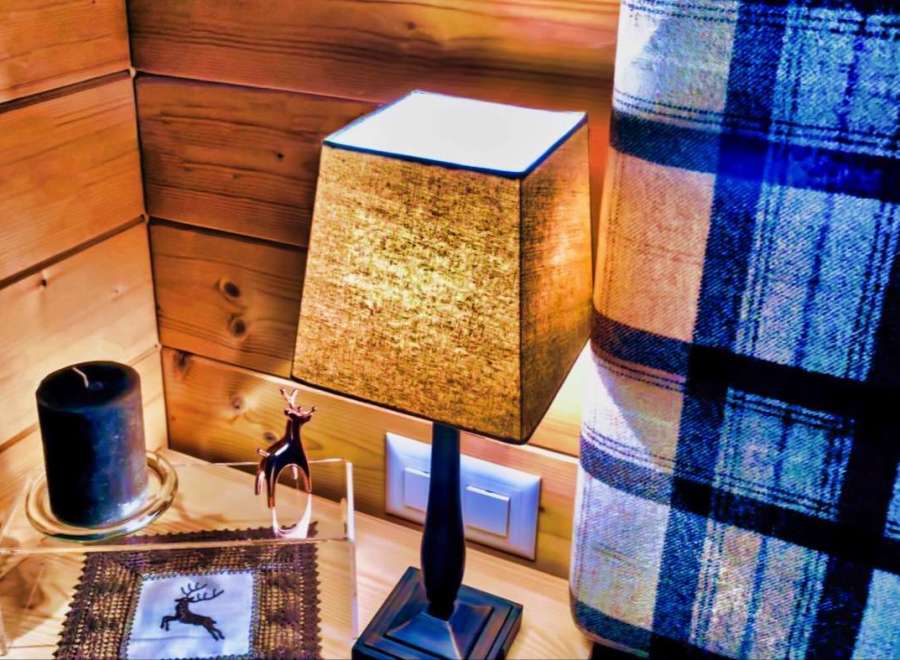 Cozy cabin vibes abound in this inviting space.