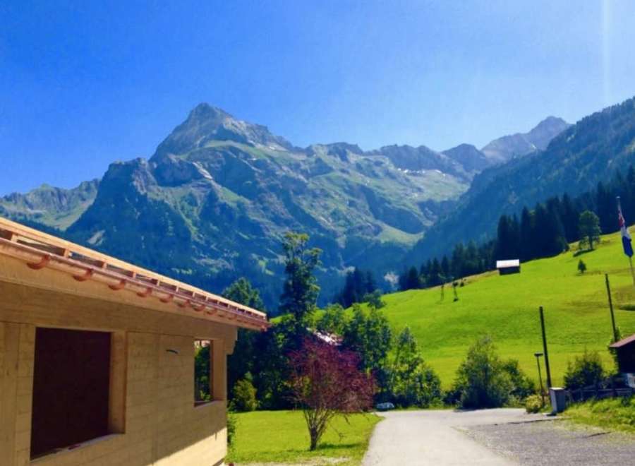Nestled amidst breathtaking mountain scenery, this property offers a serene escape.