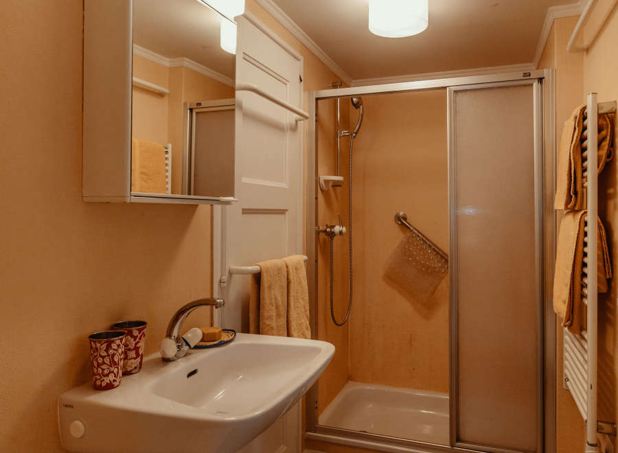 This bathroom features a classic design with a clean and functional layout.
