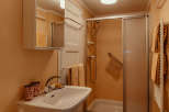 This bathroom features a classic design with a clean and functional layout.