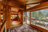 Step into a cozy chalet with stunning mountain views.