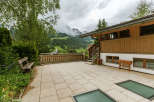 Escape to the mountains in this charming property, featuring a spacious patio perfect for enjoying the stunning views.