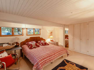 Cozy bedroom with a unique design.