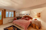 Cozy bedroom with a unique design.
