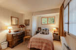 Cozy bedroom with a vintage aesthetic.
