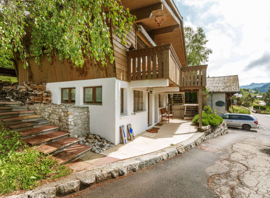 Charming wooden chalet nestled in a picturesque setting.