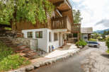 Charming wooden chalet nestled in a picturesque setting.