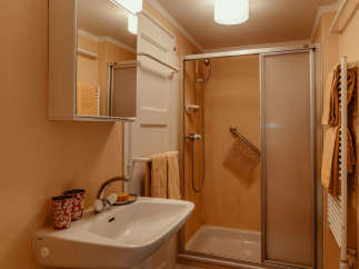 This bathroom features a classic design with a clean and functional layout.