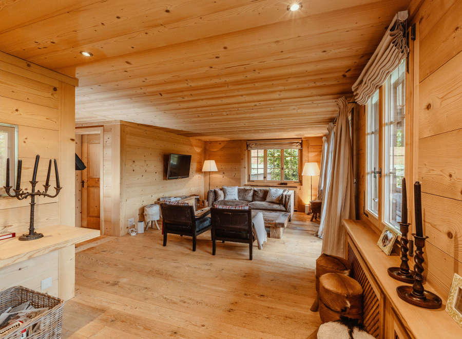 Step into a cozy, wood-paneled haven.