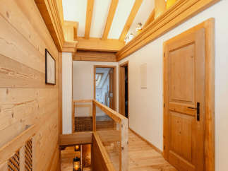 Step into a world of rustic charm with this stunning wooden interior.