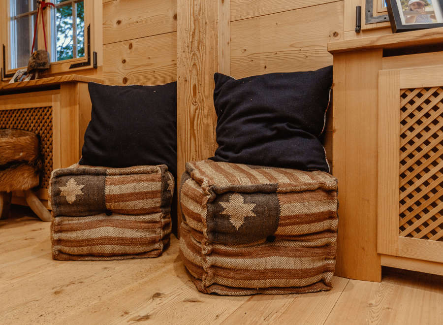 Cozy seating area with rustic wooden accents.