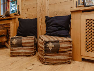 Cozy seating area with rustic wooden accents.