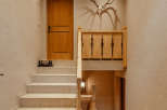 Step into rustic elegance with this charming entryway.