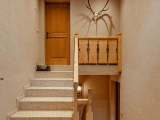 Step into rustic elegance with this charming entryway.