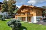 Discover the charm of this stunning wooden chalet, a perfect blend of rustic elegance and modern comfort.
