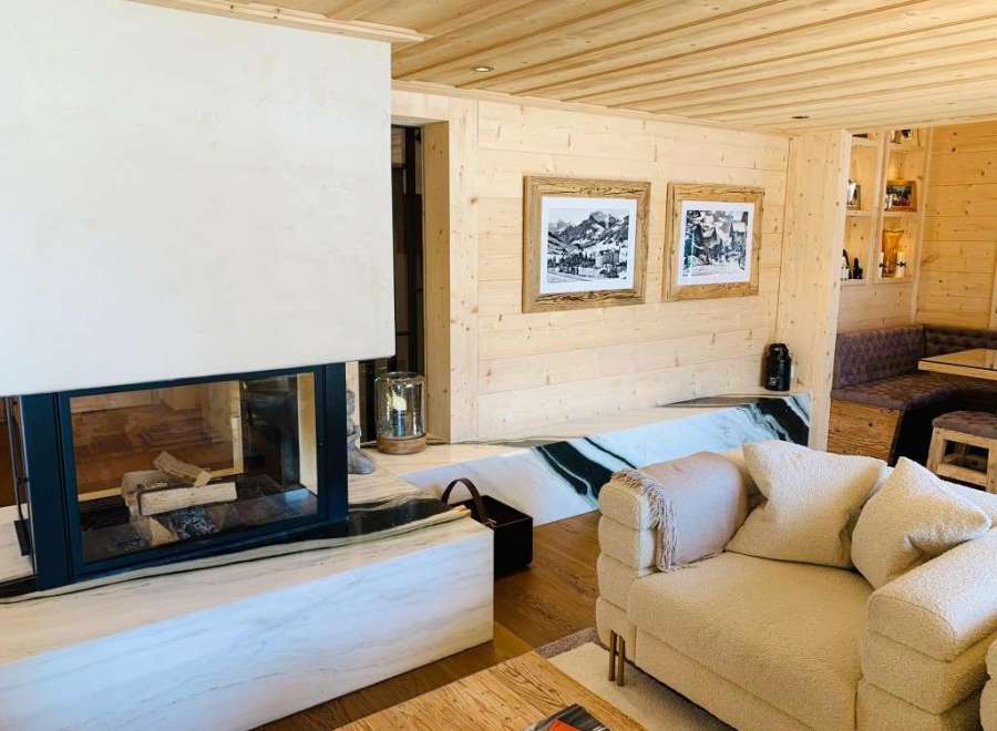 Experience the warmth of this stunning property, featuring a cozy fireplace and inviting living space.