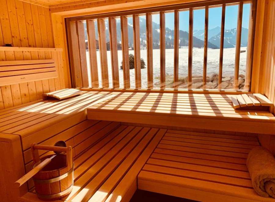 Relax and rejuvenate in this stunning sauna with breathtaking mountain views.