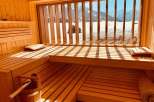 Relax and rejuvenate in this stunning sauna with breathtaking mountain views.