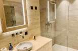 Experience luxury in this stunning bathroom featuring a modern design.