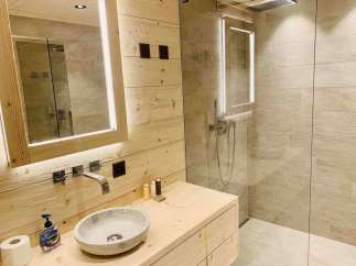 Experience luxury in this stunning bathroom featuring a modern design.