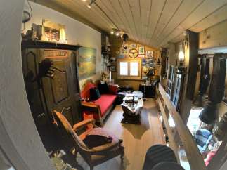 Step into a charming, rustic retreat with this unique property.