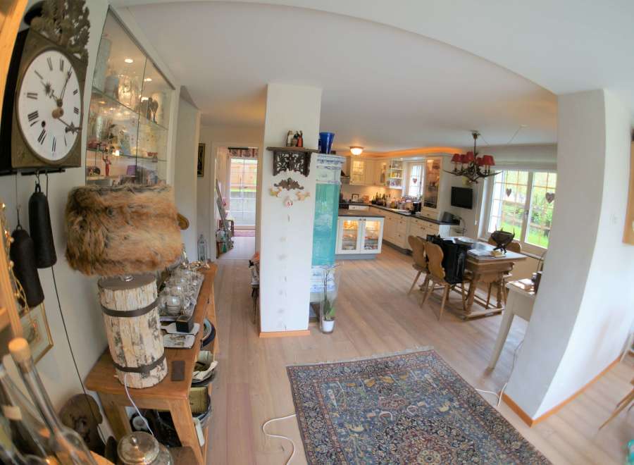 Step into a charming home with a warm and inviting atmosphere.