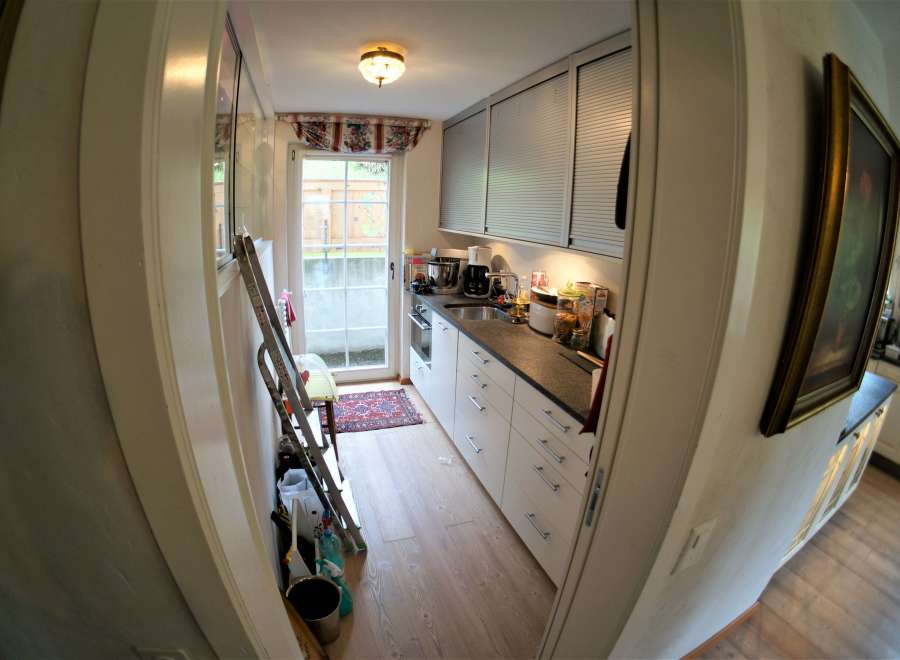 This charming kitchen features a bright and airy design with ample natural light.