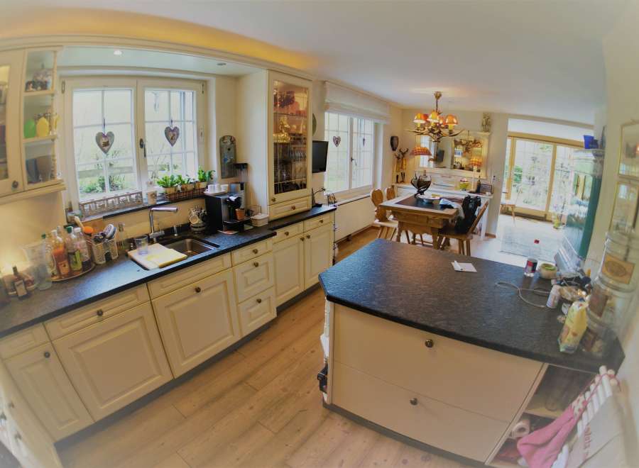 This charming kitchen boasts a bright and airy atmosphere, perfect for culinary adventures.