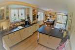 This charming kitchen boasts a bright and airy atmosphere, perfect for culinary adventures.
