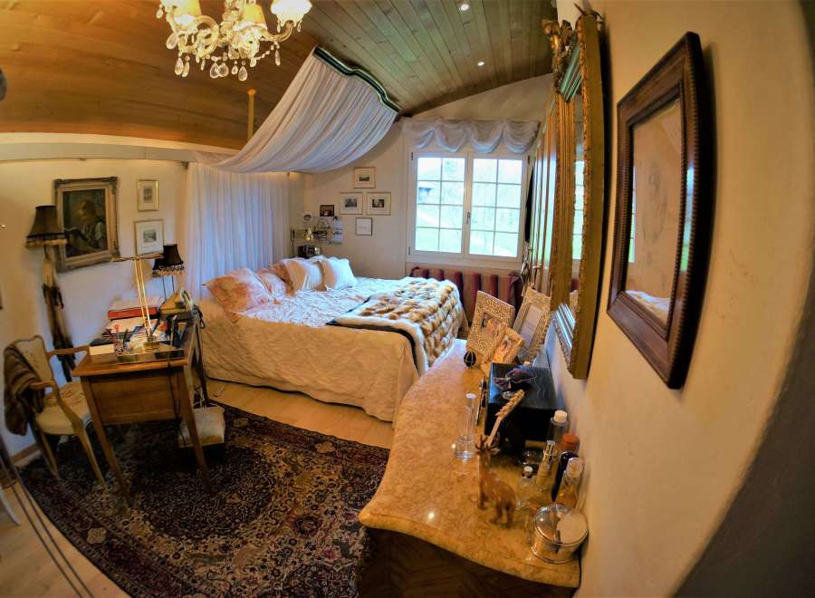 Step into a bedroom that exudes elegance and charm.