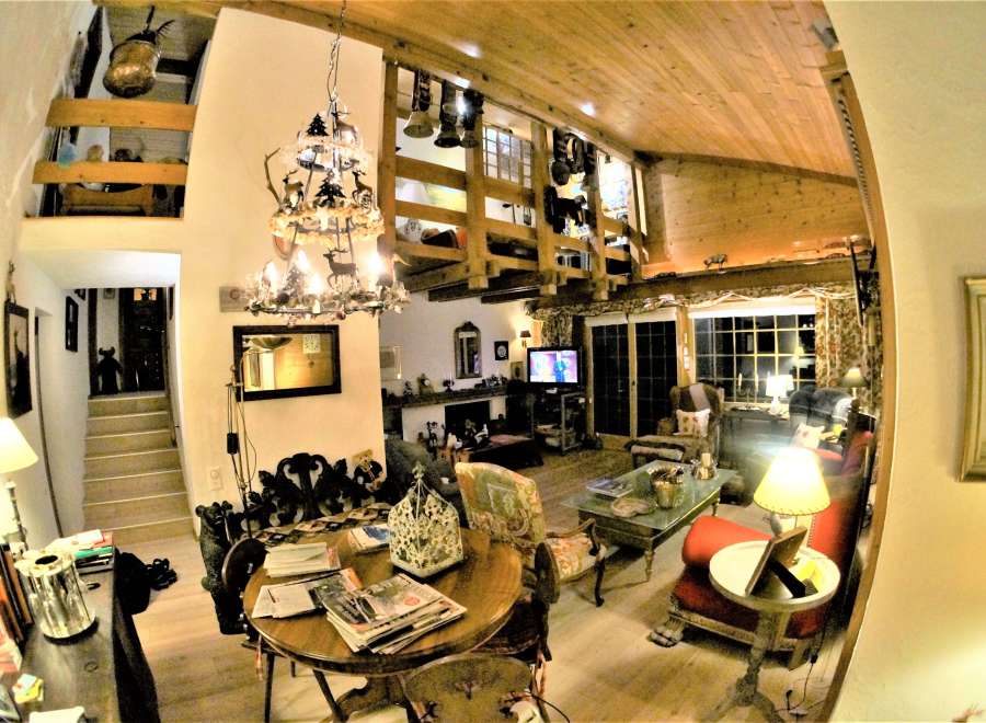 Step into a cozy chalet-style living room, perfect for relaxation.