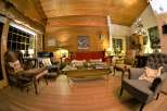 Step into a cozy and inviting living space with a warm, wooden interior.
