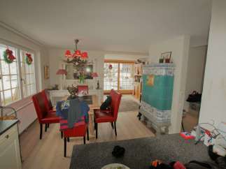 This charming property boasts a cozy dining area, perfect for gatherings.