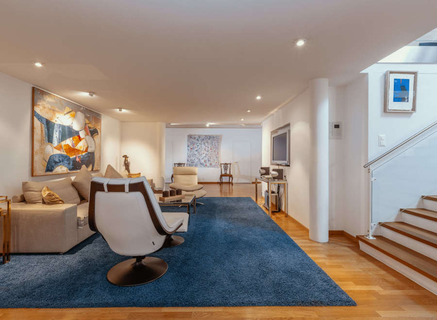 This stunning property boasts a modern and spacious living area, perfect for entertaining or relaxing.
