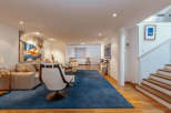 This stunning property boasts a modern and spacious living area, perfect for entertaining or relaxing.
